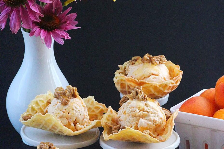 Homemade Waffle Bowls filled with tart apricot and creme fraiche ice cream and sweetened with brown sugar almonds and honey. The perfect adult indulgence.