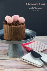 Bake a beautiful Chocolate Cake with Macarons for someone special. The cake and frosting is homemade, but the macarons are store bought.