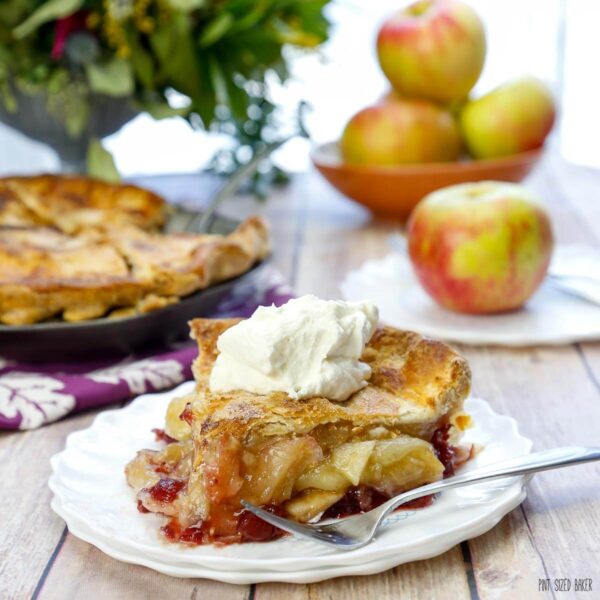 This Homemade Cranberry Apple Pie is made with fresh fruit and has half the sugar of a traditional cran-apple pie. It's bursting with flavor!