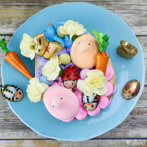 Swap out the Easter basket for a Giant Easter Cookie this year. It's a simple sugar cookie loaded up with frosting and fun Easter candy for the kids to enjoy. 