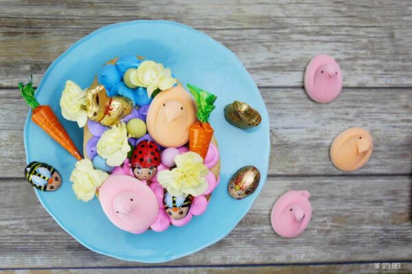 Swap out the Easter basket for a Giant Easter Cookie this year. It's a simple sugar cookie loaded up with frosting and fun Easter candy for the kids to enjoy. 