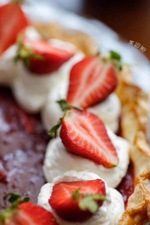 This Strawberry Pie recipe is oh so good! I love the jam like strawberry filling! It makes the perfect dessert at a tea party!