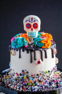 This Day of the Day Cake is perfect to serve up as a celebration of life of your past loved ones. I'd return from the dead for a slice of this colorful cake.