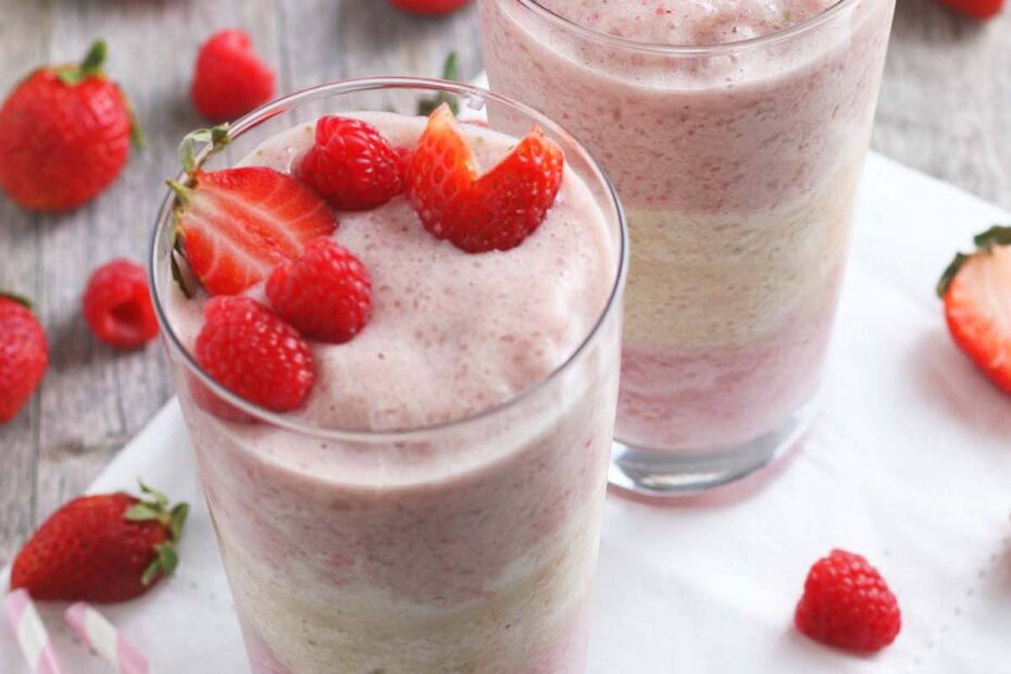 Sweet strawberries, raspberries, and banana make a great layered smoothie. Add some vanilla protein powder to this mixed berry smoothie to stay full all morning long!
