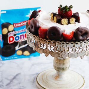 Traditional Charlottes use ladyfingers. This fun twist used donuts and strawberries!