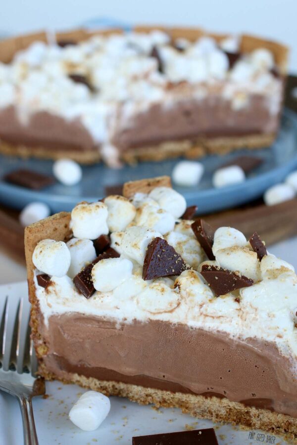 Closeup of a slice of cool and creamy S'mores Ice Cream Cake.