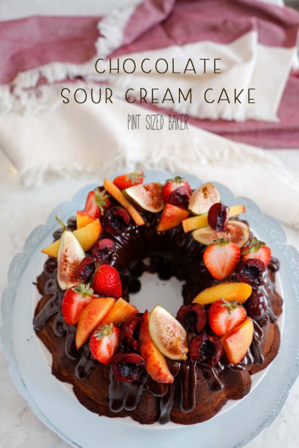 An image linking to my Chocolate Sour Cream Bundt Cake recipe that is covered in fresh fruit! 