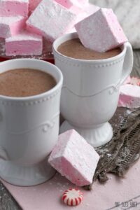 Finished pink marshmallows being served up with hot chocolate.