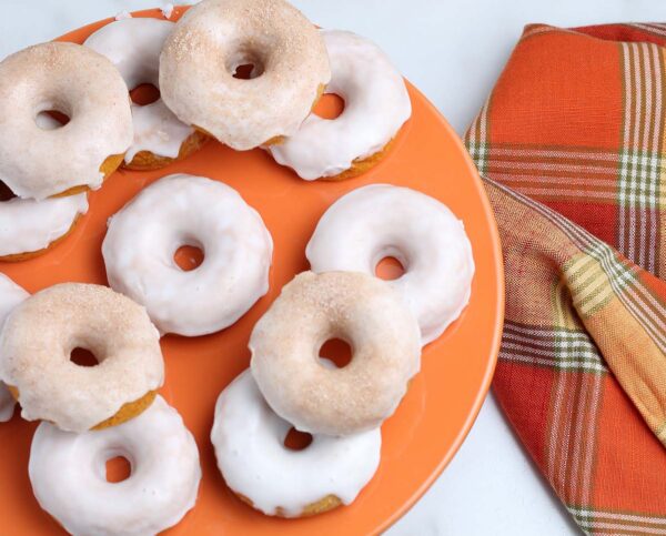 baked pumpkin doughnuts on plate