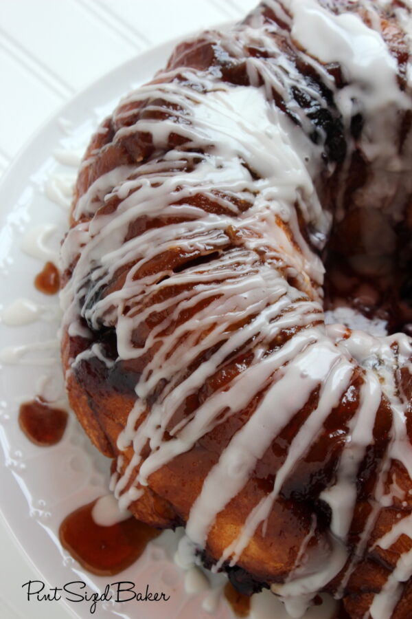 An up close image showing the sugar glaze poured over the monkey bread.