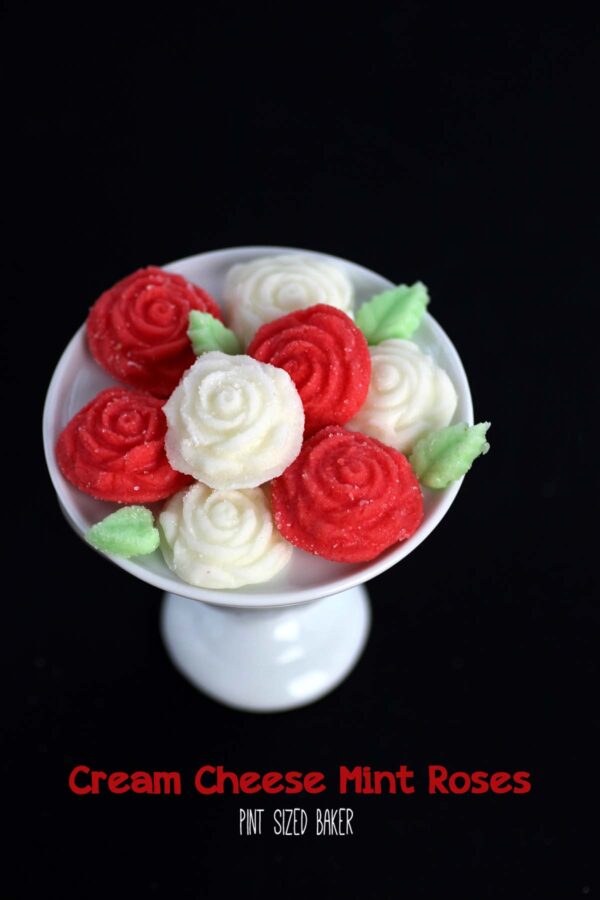 Red and white cream cheese mint roses on a small white platter. 
