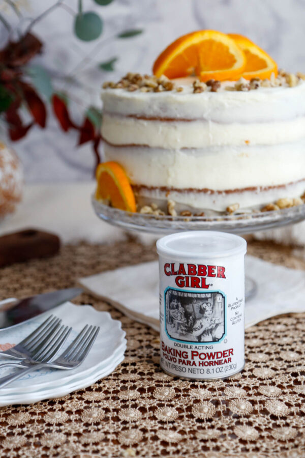 Image featuring Clabber Girl® Baking Powder with the cake in the background.