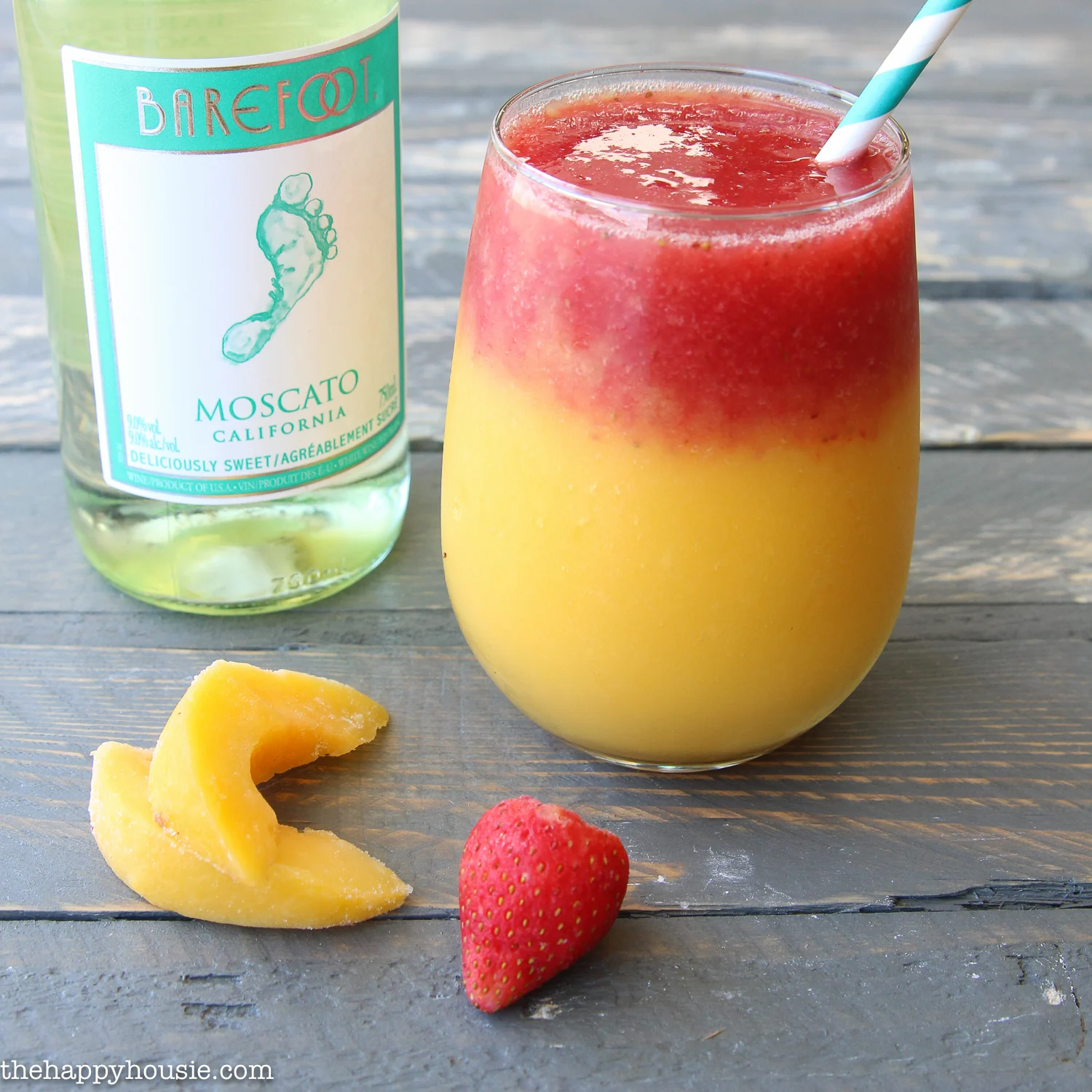 This is so good And totally easy to make Delicious Peach and Strawberry White Wine Slushies 3