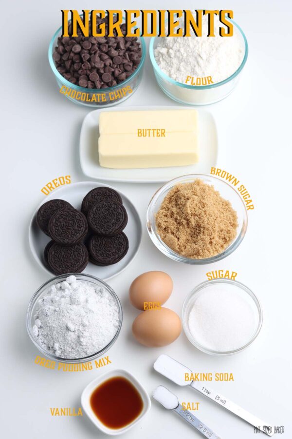 All the ingredients to make the Oreo Pudding Cookies - flour, butter, sugar, eggs, pudding mix, Oreo cookies, and more.