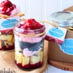 Raspberry trifles in glasses on a table