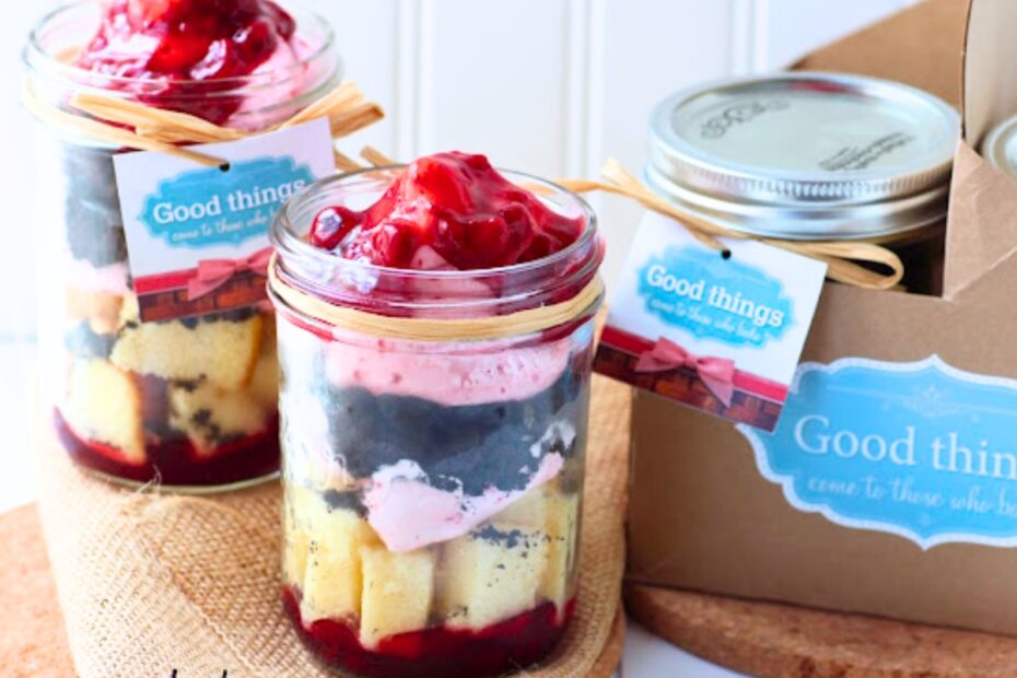 Raspberry trifles in glasses on a table